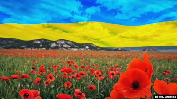 Небо у кольорах українського прапора над кримськими горами. Колаж