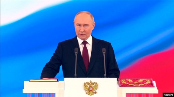 Президент Росії Володимир Путін складає присягу під час церемонії інавгурації у Кремлі в Москві, 7 травня 2024 року