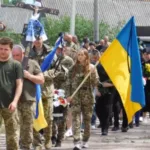 Храм не вмістив охочих попрощатись із захисником: у Зарічному в останню путь провели 32-річного Миколу Самуйлика