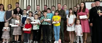 «Батьківське серце»: у Копачівській громаді дітям полеглих захисників вручили срібні обереги
